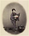 BEATO, FELICE (1832-1909) An album containing 17 artfully hand-colored photographs of Japan, all occupational views,